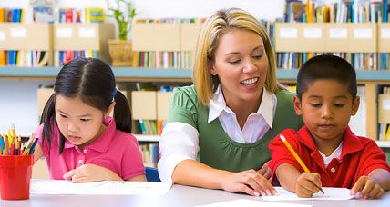 photo of teacher with students